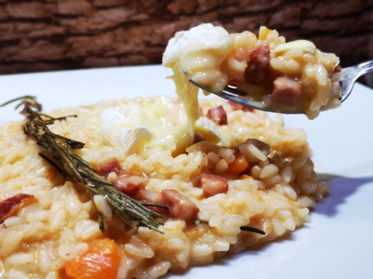 Risotto con zucca e guanciale mantecato al brie