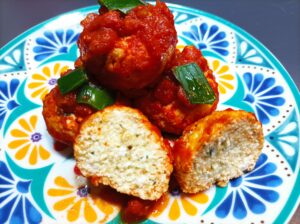 Polpette di ricotta in rosso